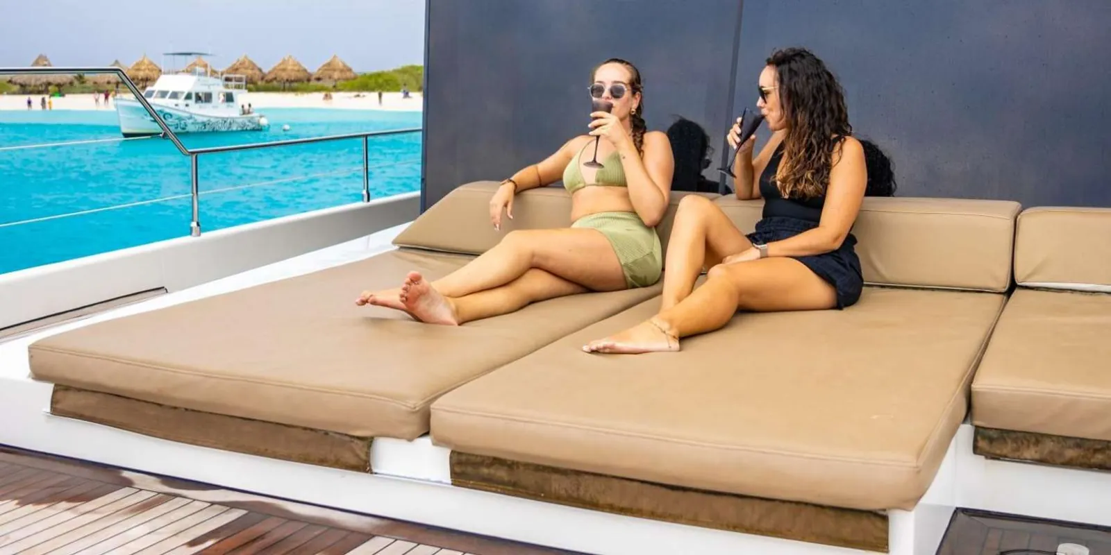 Guests on the Gold Seahorse's cushioned sun deck during the crossing to Klein Curacao