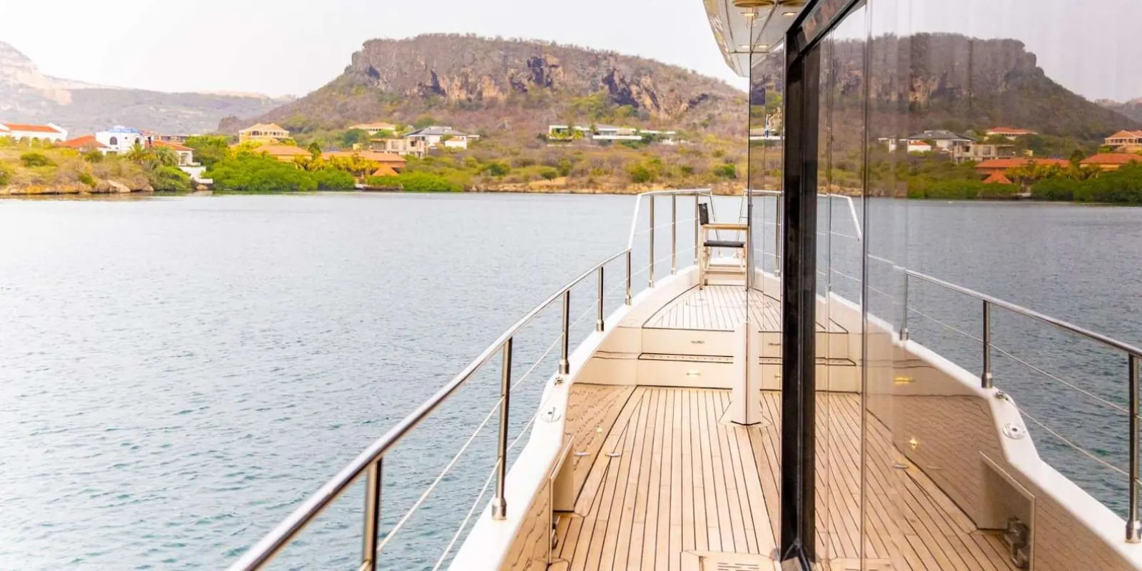 The teak side deck looking out over Spanish Water towards Table Mountain