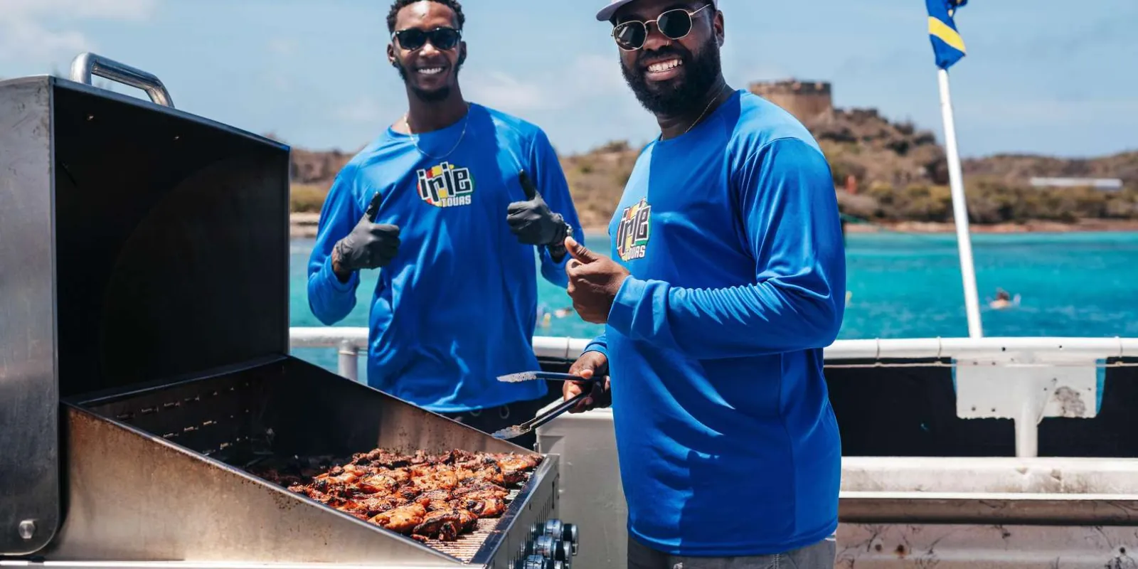Crew grilling the barbecue lunch skewers on the back deck